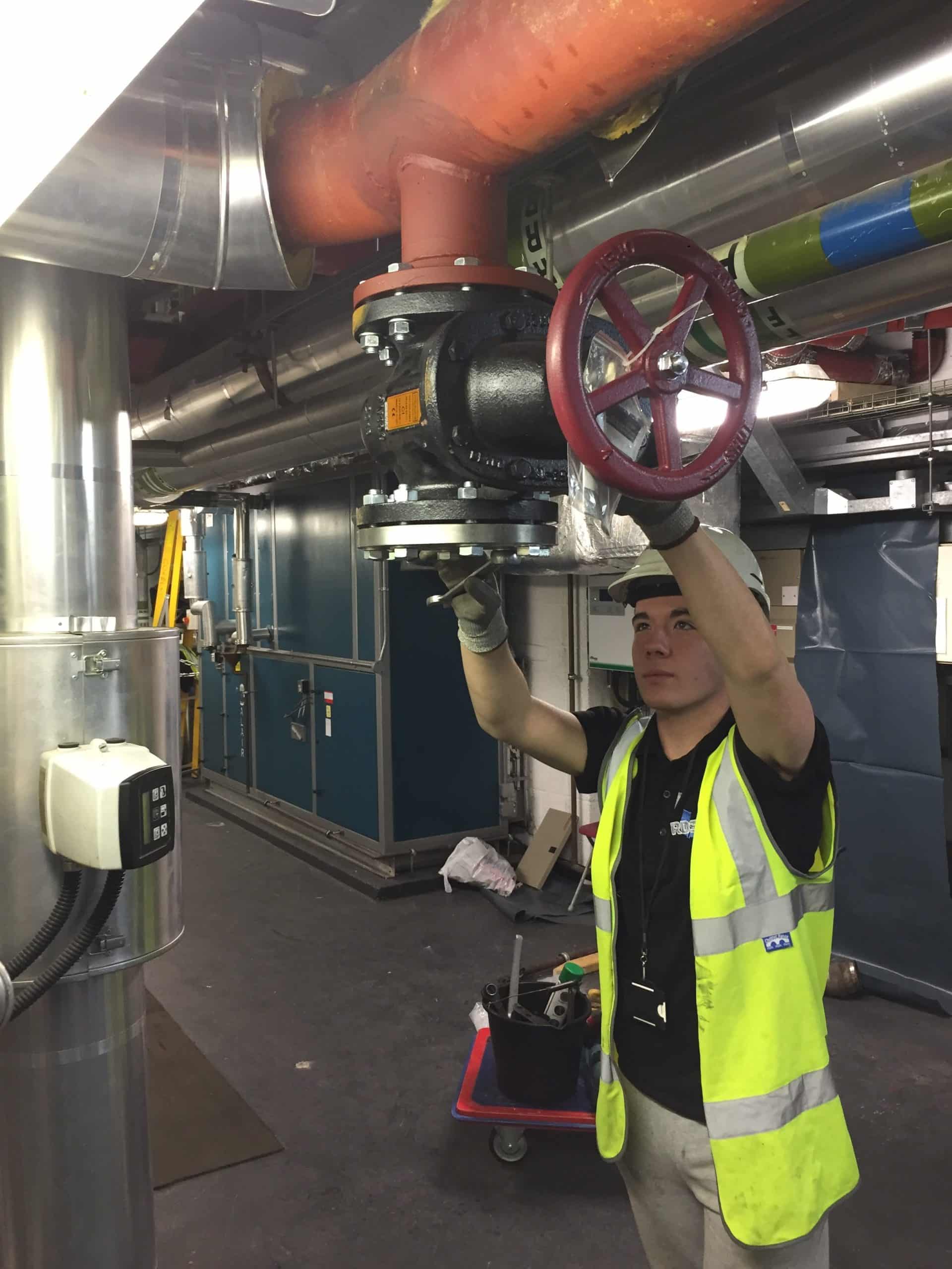 RDS engineer performing a hot tap on a live pipeline